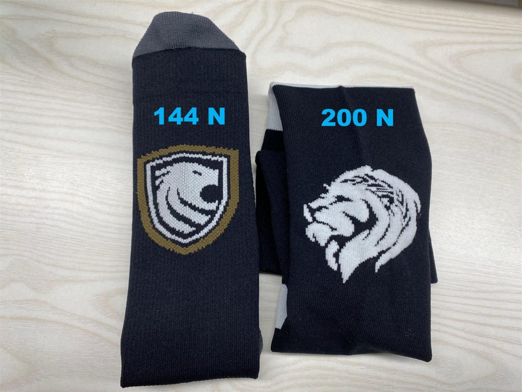 Different needles of socks shown from logo detail: 144N vs 200N.