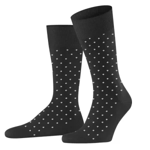 Black patterned dress socks with small white dots