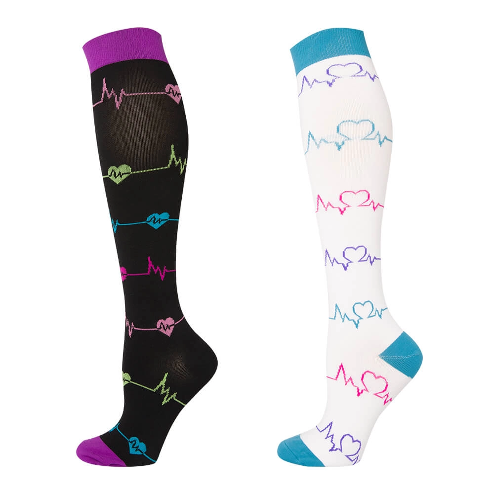 Women nursing socks with colorful heartbeats design for comfort and support during long shifts.