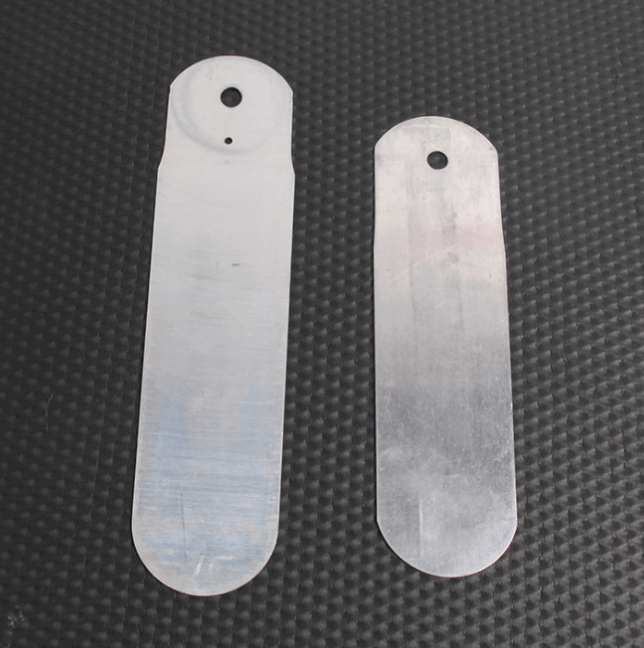 Straight boarding: Metal forms used for shaping socks after manufacturing.