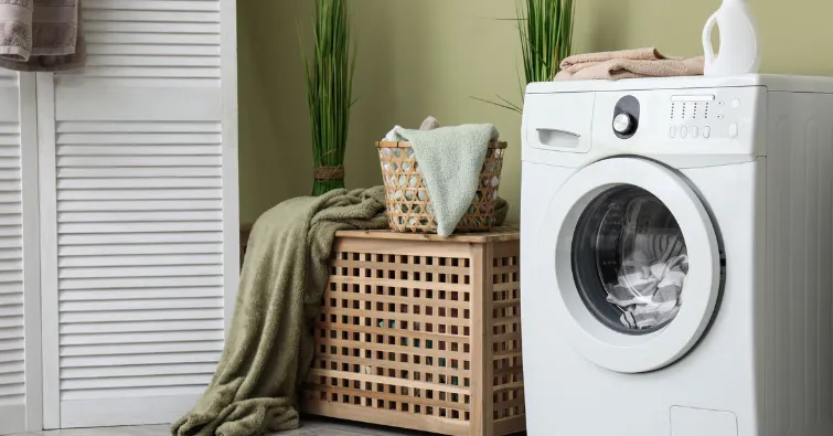 A washing machine and laundry basket, suitable for washing football grip socks.