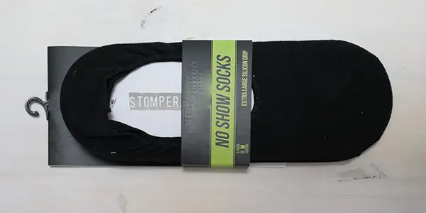 No show socks packaging featuring a black pair with a silicon grip.