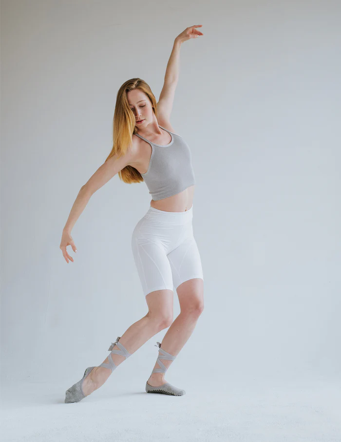 Custom dance ballet grip socks worn by a dancer.