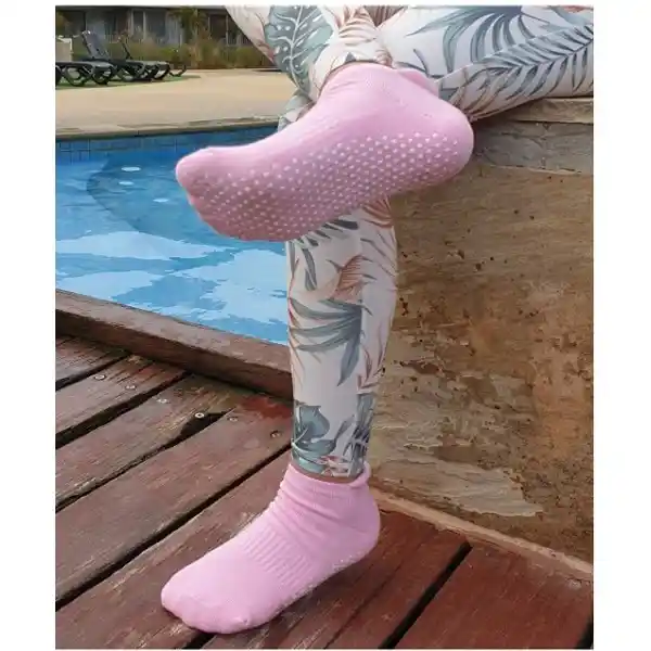 Custom grip socks for swim pool safety on wet surfaces.