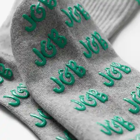 Non-slip sticky socks providing grip for Pilates and yoga practice