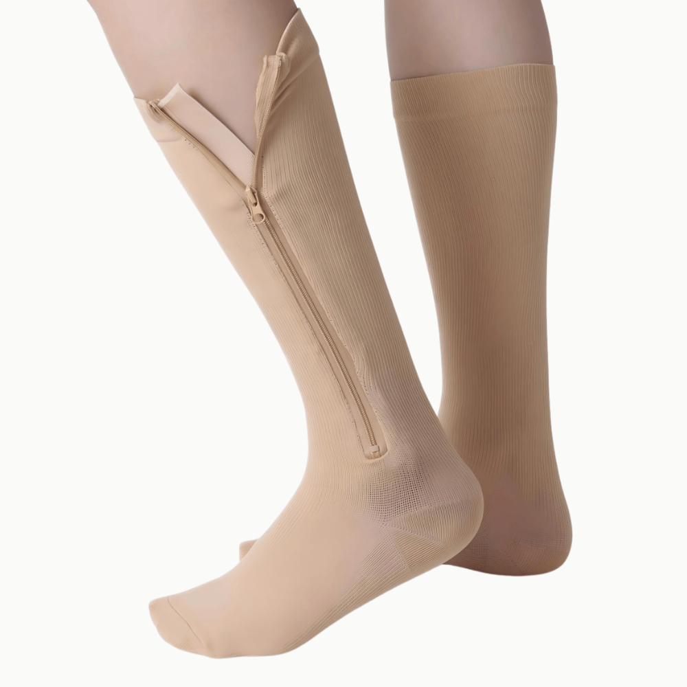Zippered compression socks in a neutral tone, showcasing the convenient zipper design