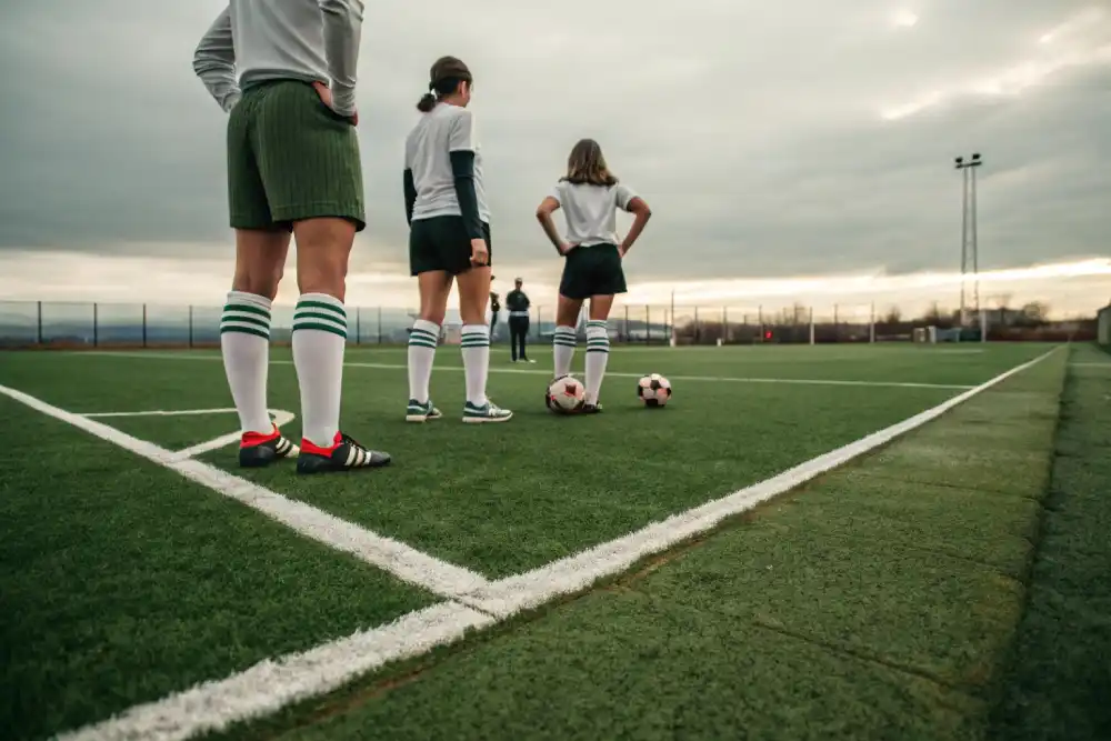 athlete wearing soccer socks stand