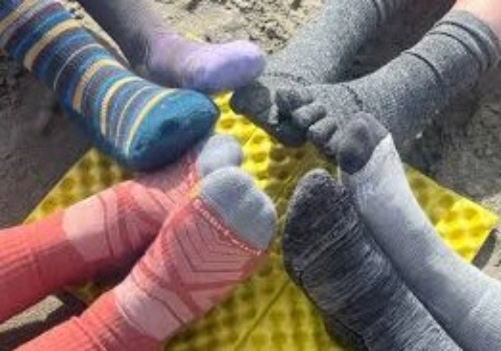 European and American consumers choosing between Merino wool socks and alpaca wool socks in everyday wear