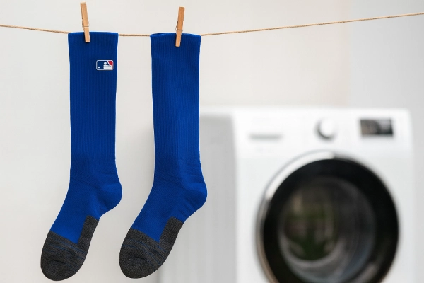 Baseball socks air drying after gentle washing to maintain elasticity