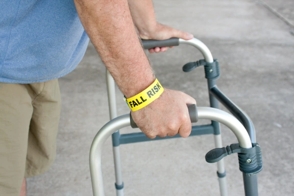 Common hospital fall risks like slick floors and bed transfers increase the need for non slip socks