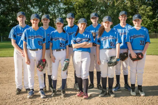 Youth baseball team wearing high socks to build team unity and tradition