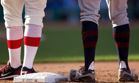 Examples of mistakes when wearing baseball socks high such as sagging or uneven heights
