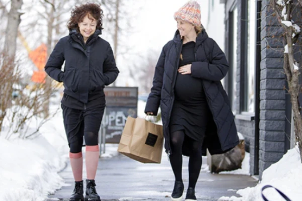 Crew length compression socks colour matched to trousers keeping smooth fit