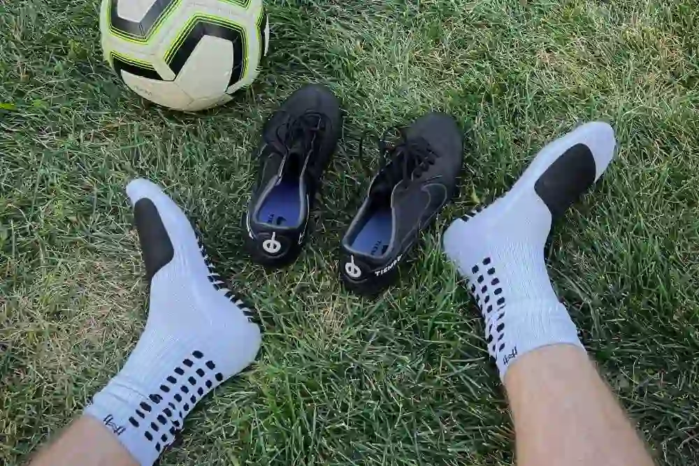 Sports grip socks with directional tread for athletic performance