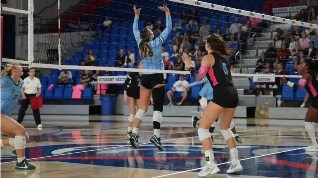 Girls playing volleyball with custom socks