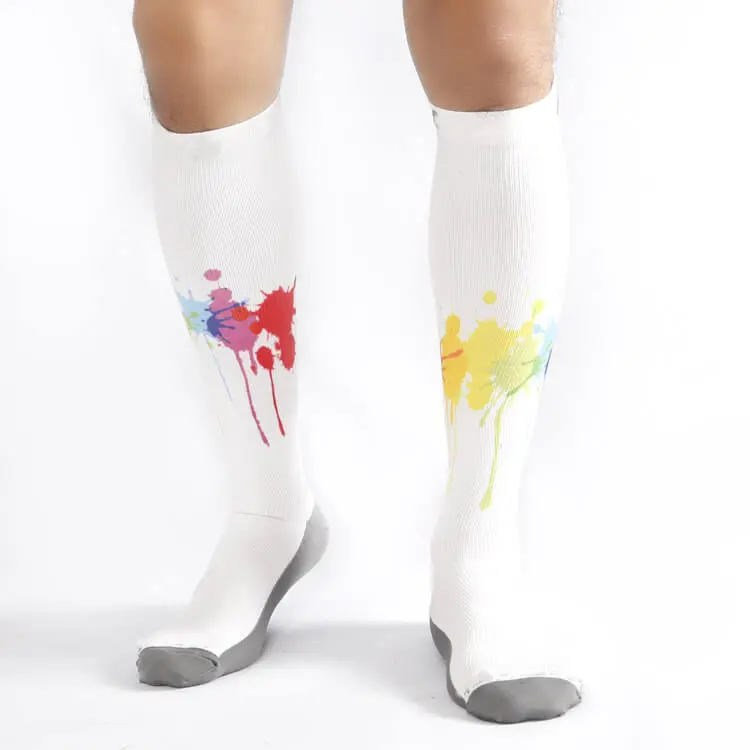Printing compression socks with colorful paint splash design on white athletic socks