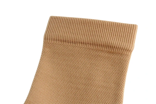 Beige open toe zipper compression socks worn on feet for ankle support
