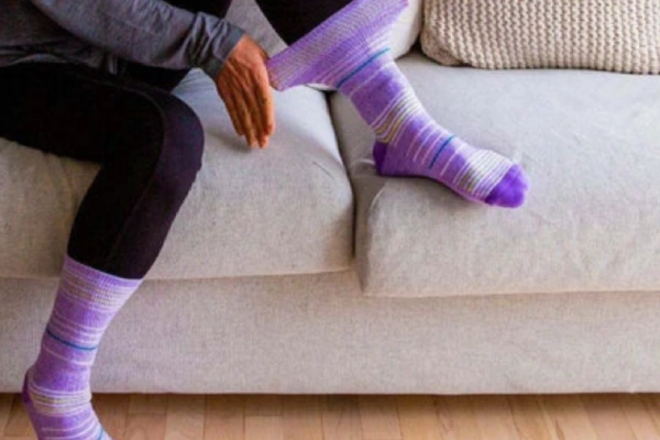 Comfortable diabetic socks in use by a senior in a daily routine setting