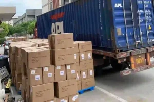 Shipping containers and cardboard boxes ready for logistics transportation and distribution