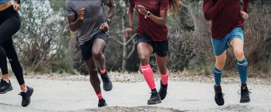 Group photo showing diverse people wearing compression socks while walking