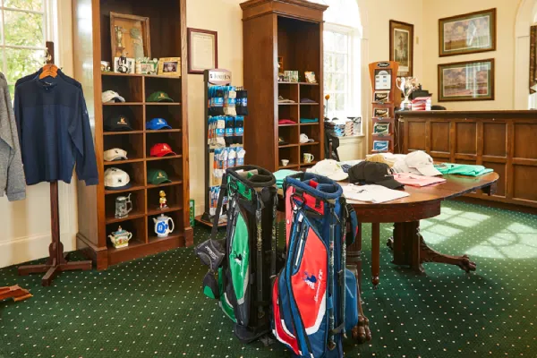 Retail display of golf socks alongside golf polos and accessories