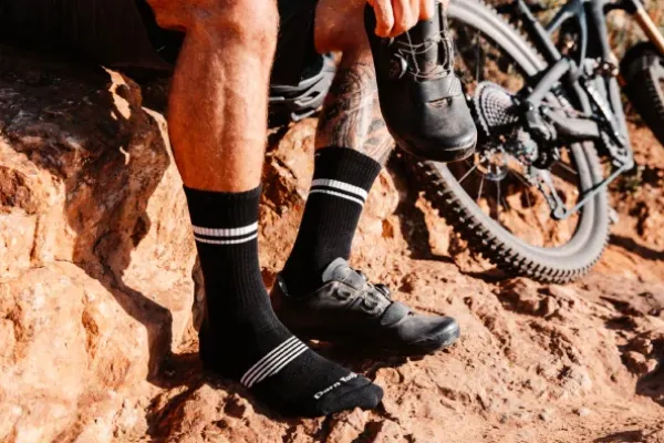 Black and white striped MTB socks, perfect for mountain biking.
