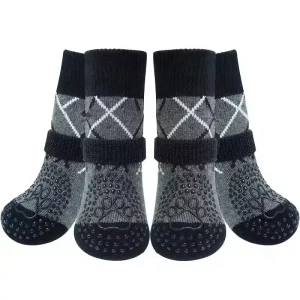 Four grey and black dog socks with grip and an argyle pattern.