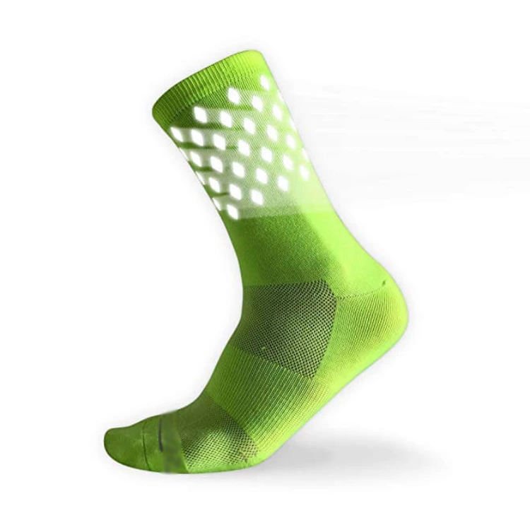 Reflective cycling socks in bright green with white diamond reflective elements.