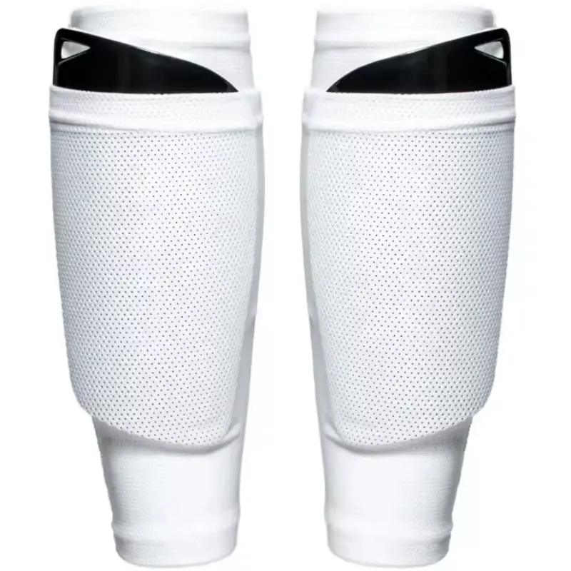 White shin guard socks with perforated mesh and pockets for inserts.