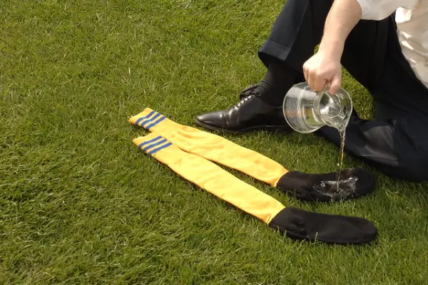 Waterproof football socks keeping feet dry during rainy football matches