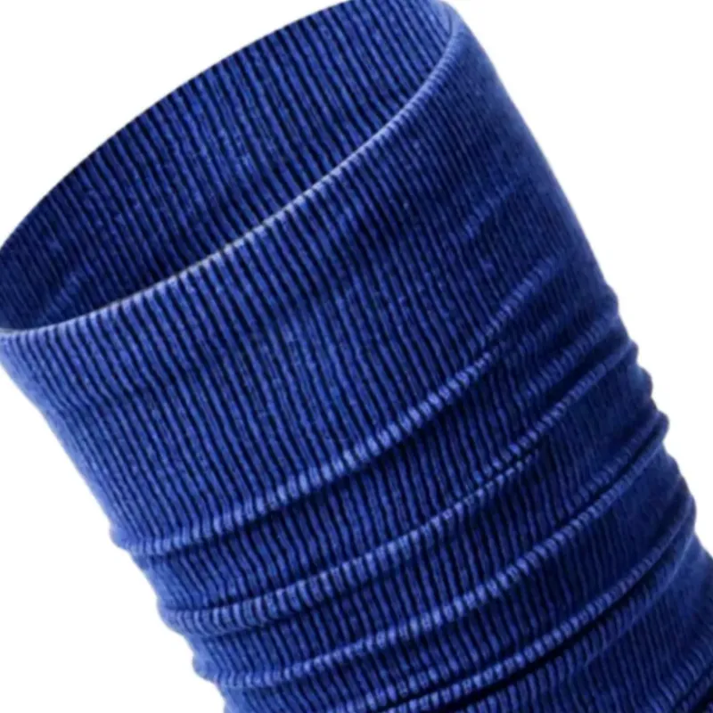 youth football scrunch socks detail showing the flexible ribbed texture and deep blue color
