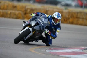 Low density ribbed instep panel in motocross socks flexing with rider ankle during cornering