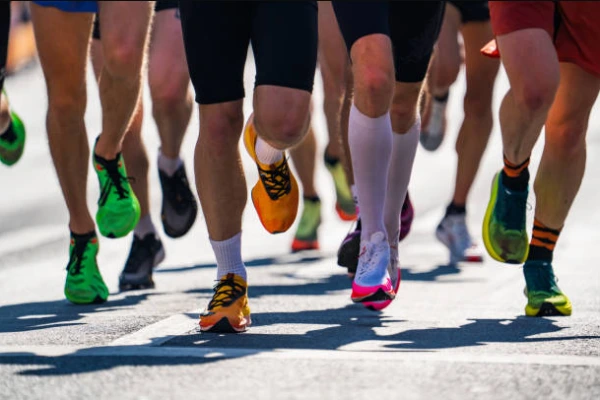 Marathon runner wearing breathable running socks for comfort and blister prevention during long distance training
