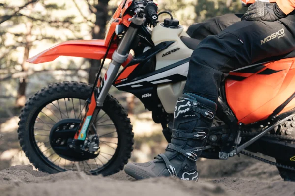 Posterior mesh back panel on motocross socks venting heat and moisture behind the calf