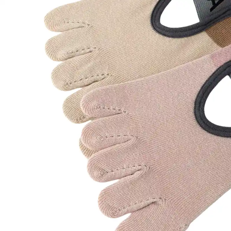  Close-up of beige and pink yoga toe socks for men with cutouts and individual toe pockets Long striped full toe grip socks with detailed views of texture, stretch, and anti-slip grips