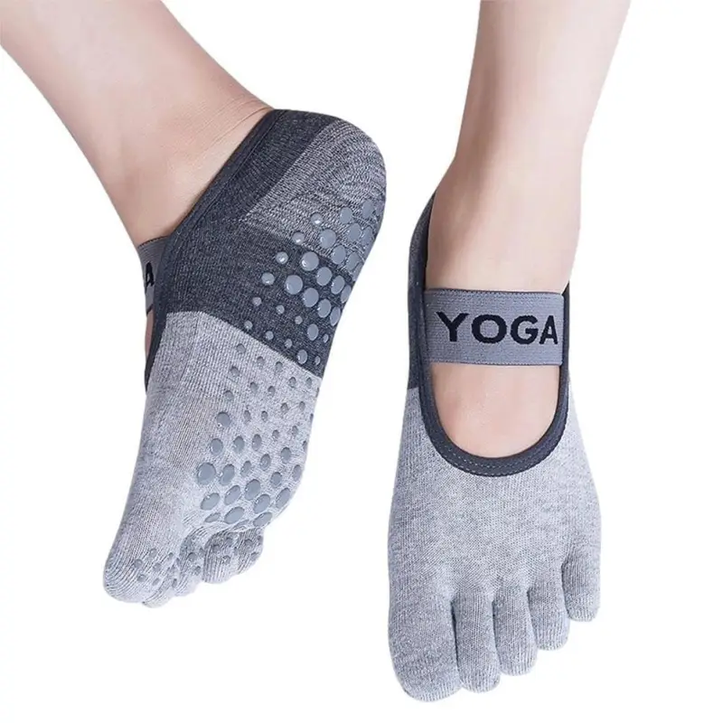  Gray and charcoal yoga toe socks for women with a YOGA elastic strap and non-slip sole grips