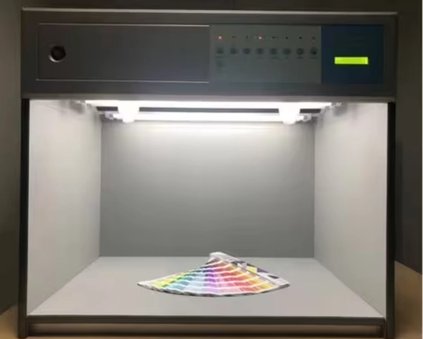 A selection of colorful cycling socks with quality control labels and recycled material tags, illustrating durability testing and sustainability trends