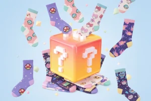Blind box sock mystery packs with one opened to reveal a colorful pair