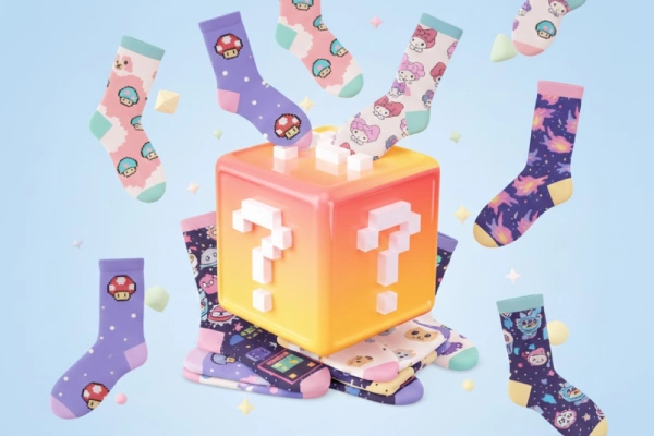 Blind box sock mystery packs with one opened to reveal a colorful pair