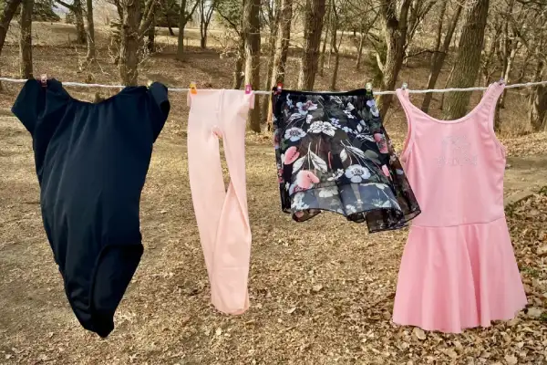 Care scene showing tights hand washed in cold water and hung to air dry