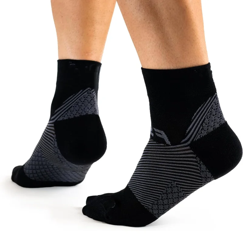 Black plantar fasciitis support socks showing targeted arch and heel compression design