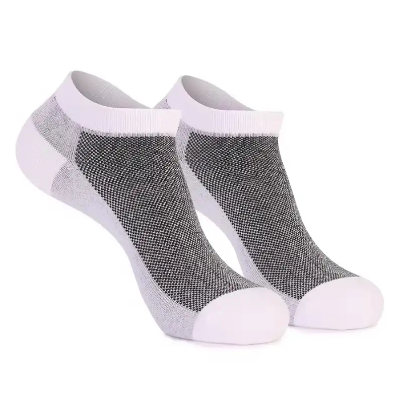 Gray and white moisture-wicking no show socks displayed for the Custom No Show Socks Manufacturer page under Your Complete No-Show Sock Portfolio module.