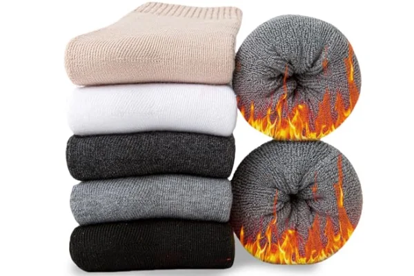 Stacked warm knit socks highlighting thermal insulation performance features