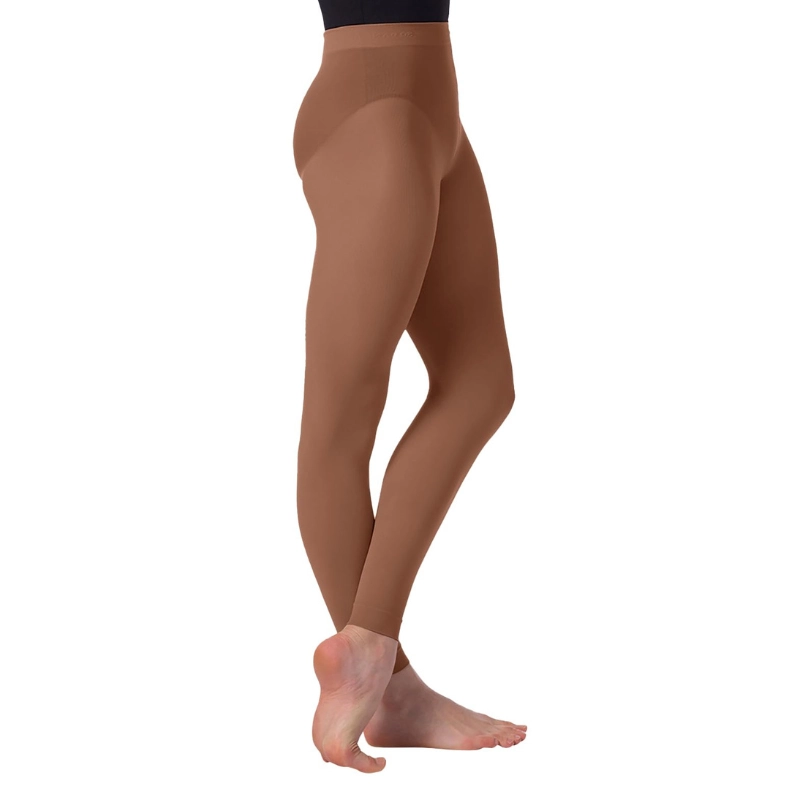 Footless dance tights in nude color showing smooth fit and leg contour for performance