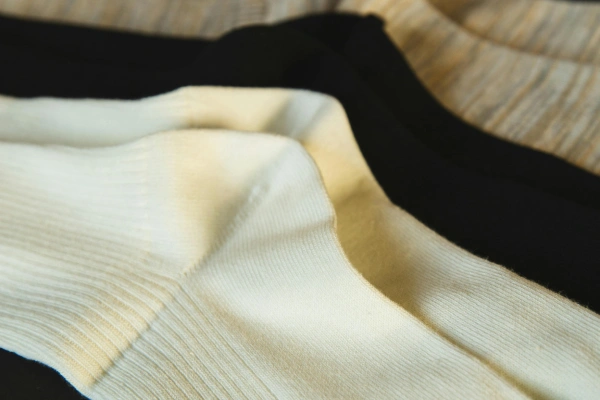 Crew socks neutral cotton socks neatly arranged on surface