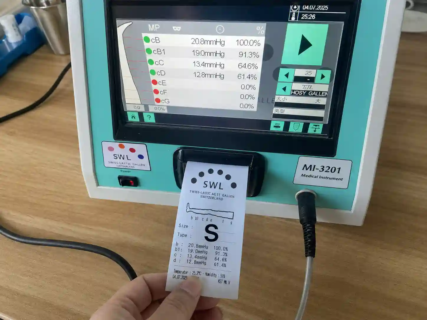Medical compression level test results displayed on device screen