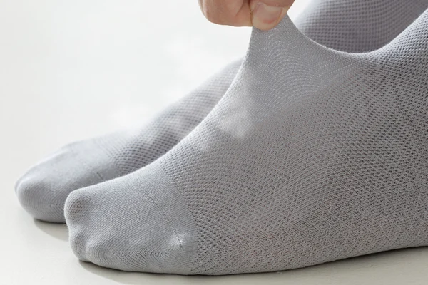 Close-up view demonstrating fine gauge knitting for dress footwear