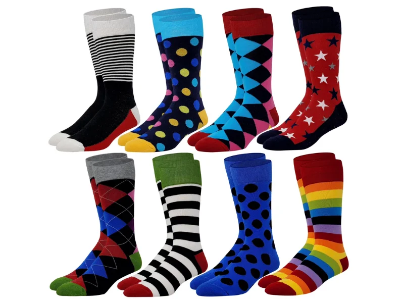 Multiple pairs of colorful dress socks featuring custom patterns