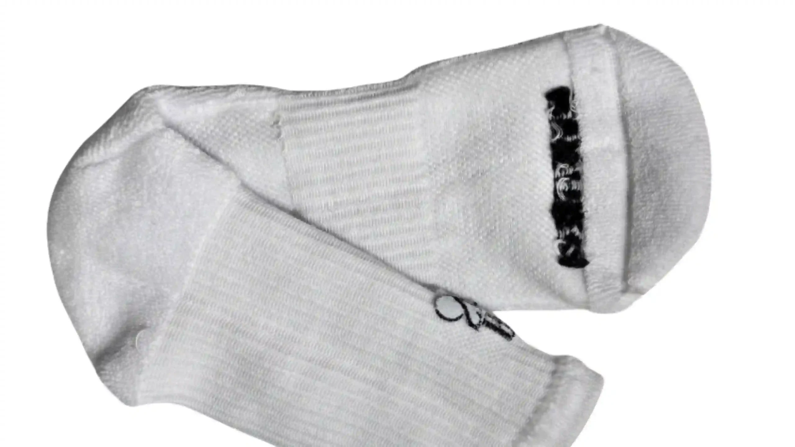 White athletic sock showing high-density terry cushioning zones inside the heel and toe