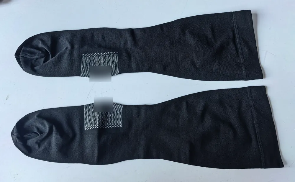 Black 15-20 mmHg knee-high medical compression socks with knitted sole pattern